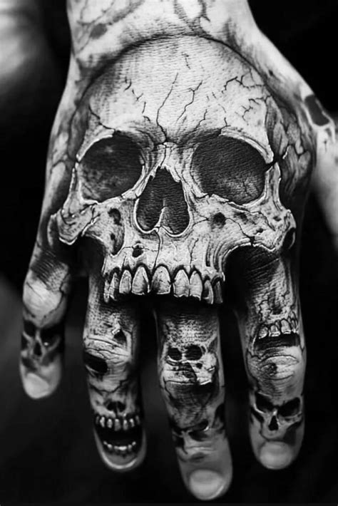 14 Skull Hand Tattoo Inspiration You Ll Want To Steal