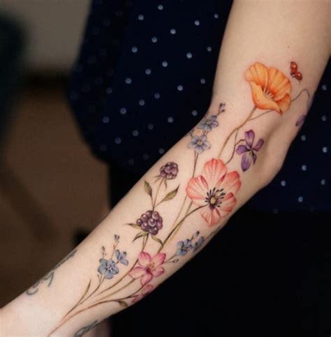 16 Stunning Floral Arm Tattoos Blooms To Adorn Your Arms