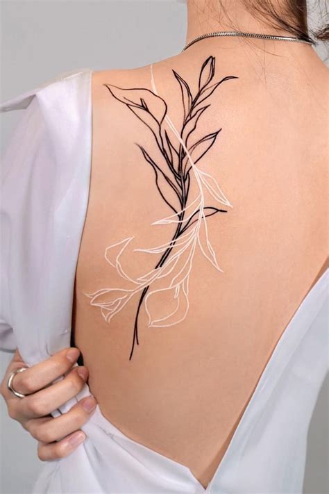 30 Glamorous Back Tattoo Ideas For Women 30 Glamorous Back Tattoo Ideas For Women