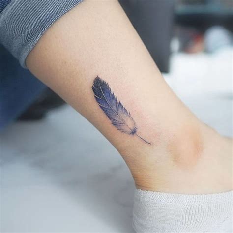 50 Beautiful Feather Tattoo Designs Tattooadore 50 Beautiful Feather Tattoo Designs Tattooadore