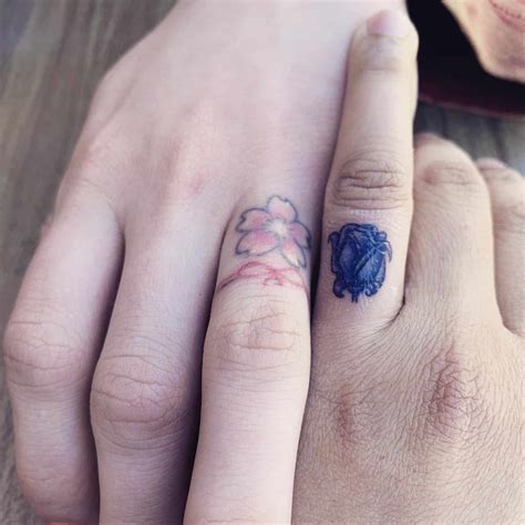 Flower Wedding Ring Tattoo At Zachary Mustar Blog