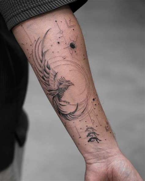 Intricate Black And Gray Phoenix Tattoo On Forearm With Sharp Details Intricate Black And Gray Phoenix Tattoo On Forearm With Sharp Details
