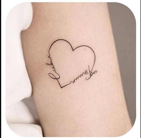 Names In A Heart Shape Tattoo