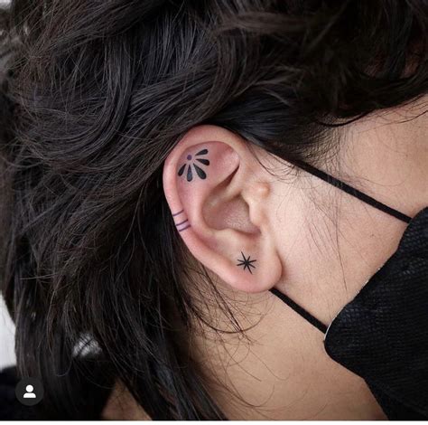 Pin By Megan Maurer On Interesting Body Art Ear Lobe Tattoo Ear