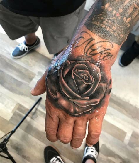 Rose Tattoos On Hand For Men