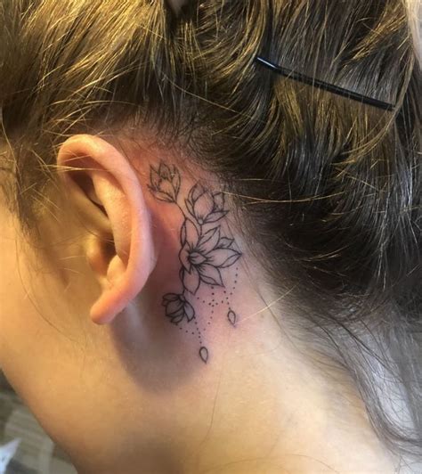 Simple Lotus Flower Tattoo Behind Ear